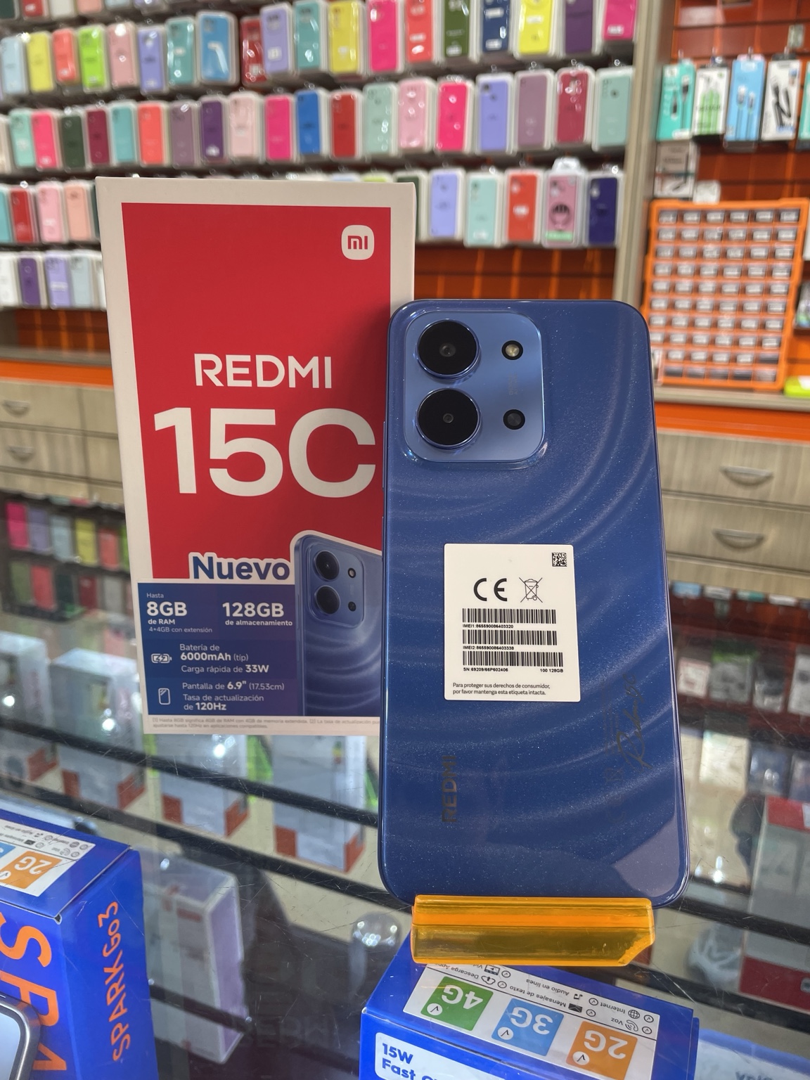 Redmi 15C azul con su caja